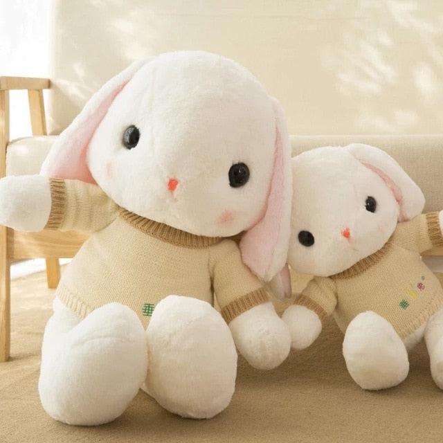 Adorable rabbit plushies in a sweater