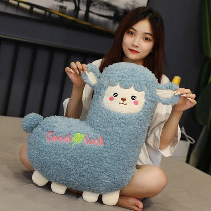 Alpaca plush toy with blanket