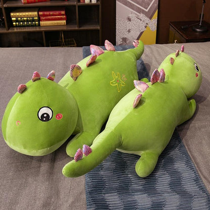 Peluche dinosaure géant vert endormi