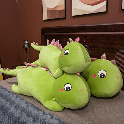Peluche dinosaure géant vert endormi
