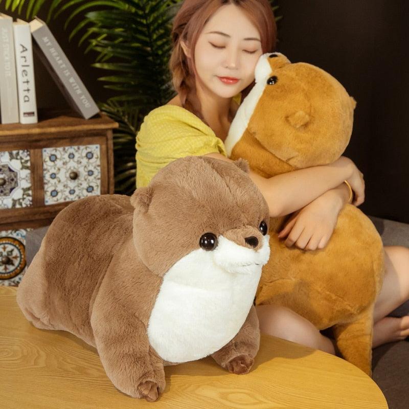 Poupées en peluche réalistes et mignonnes en forme de loutre