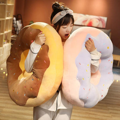 Giant plush donut cushions