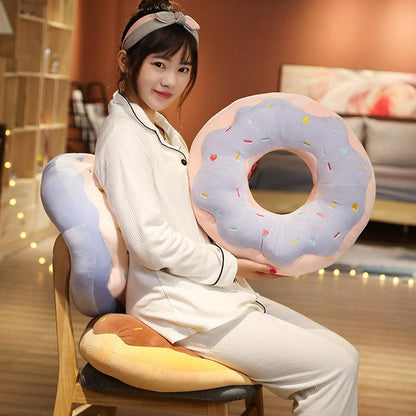 Giant plush donut cushions