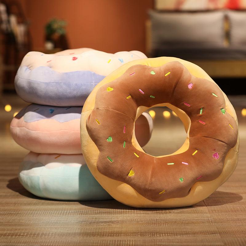 Giant plush donut cushions