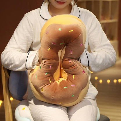 Giant plush donut cushions