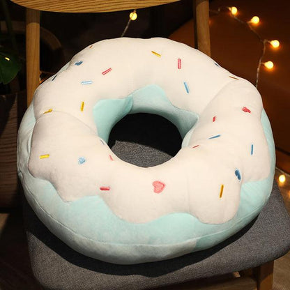 Giant plush donut cushions