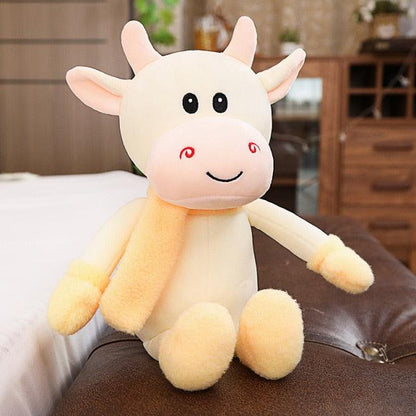 Animal en peluche vache avec jupe