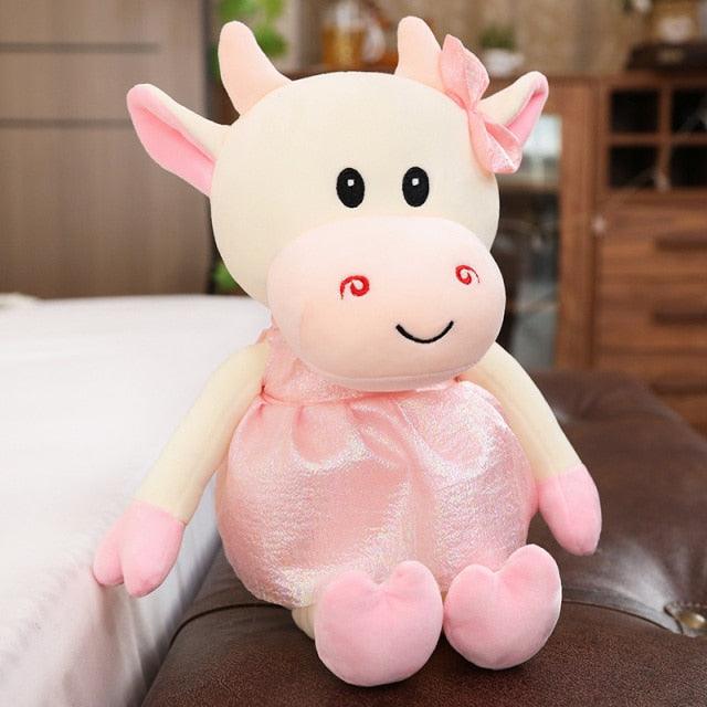 Animal en peluche vache avec jupe