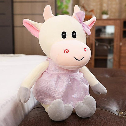 Animal en peluche vache avec jupe