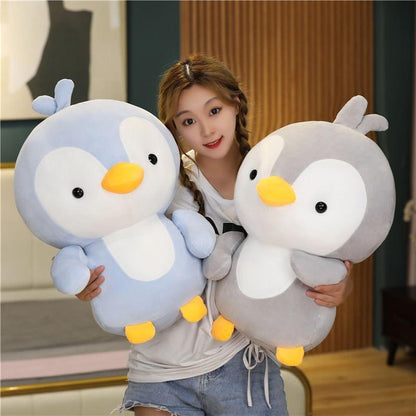 Adorable plush penguin couple