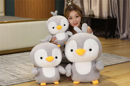 Adorable plush penguin couple