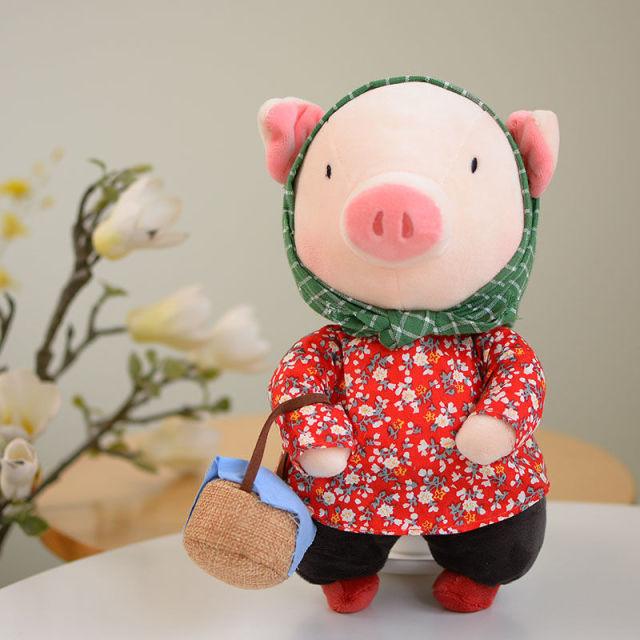 Dressed pig soft toys