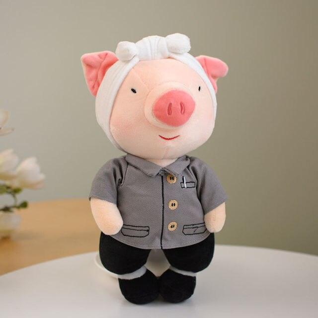 Dressed pig soft toys