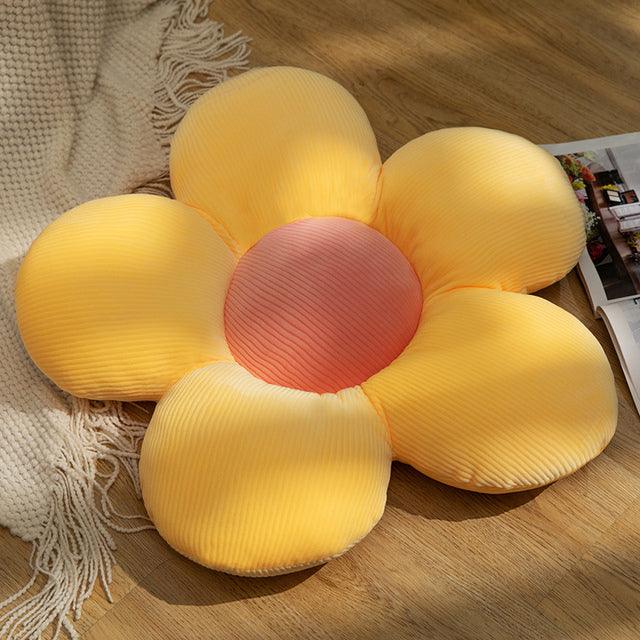 Plush pillows with colorful flowers