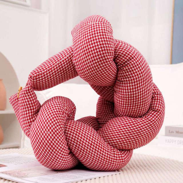 Multifunctional Pillow with Long Twisted Braids