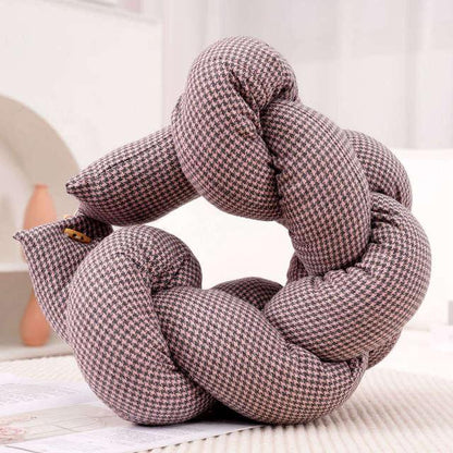 Multifunctional Pillow with Long Twisted Braids