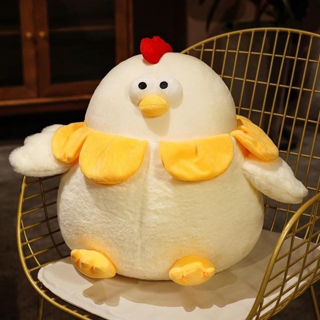 Plush pillow in the shape of a big-eyed chicken