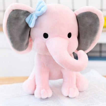 Gray and pink sleeping elephant toys